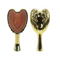 Гребінець ANGEL METALLIC (золотистий) MIC A001