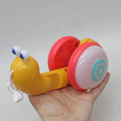 Каталка музична Веселий равлик, помаранчева MIC 1620B