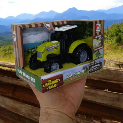 Машинка Трактор на батарейках, світло, звук, 11 см Huanzhi Toys 550-1P