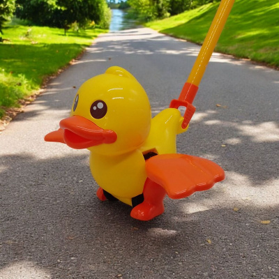 Каталка на паличці з ручкою Каченя (жовта) MIC 360