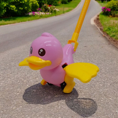 Каталка на паличці з ручкою Каченя (рожевий) MIC 360