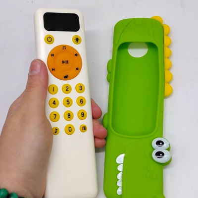 Пульт підсвічування (мелодії, звуки погоди та тварин, цифри, слова, озвучення англійською мовою, регулювання гучності, гумовий чохол) КРОКОДИЛ Lucky Baby LDJ248