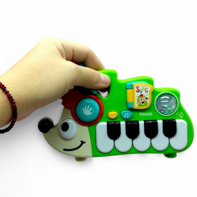 Піаніно Їжачок веселун ОЗВУЧУВАННЯ УКРАЇНСЬКОЮ МОВОЮ, (САЛАТОВИЙ) Wtoys 37746