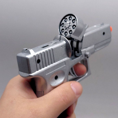Пістолет металевий під пістони, на планшетці 20,5*14*3,5 см MIC C2002B