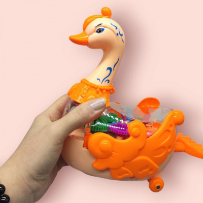 Музична іграшка Лебідь, зі світлом (карамель) FENG SHENG FW-2066A